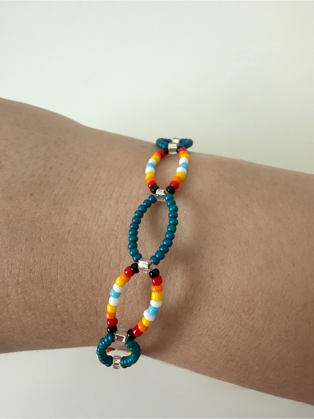 Handmade Multicolor Seed Bead Bracelet with Teal Accents